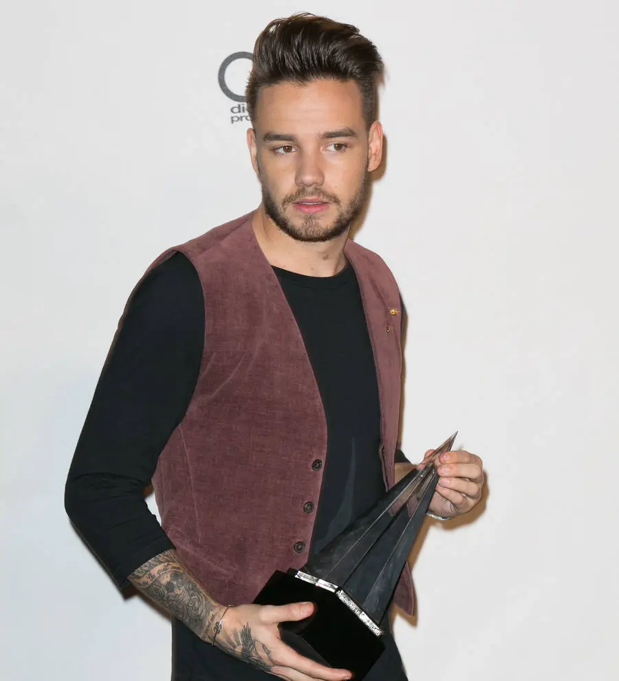 Liam Payne helping Bono out with AIDS fundraising push