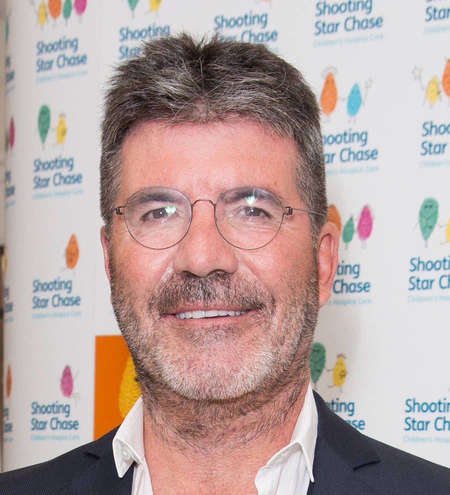 Simon Cowell released from hospital, suffering from concussion
