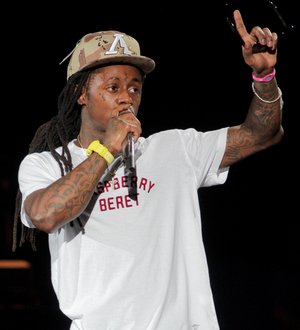 Lil Wayne tops Kanye West and Jay-Z's iTunes record