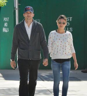 Ashton Kutcher shares intimate photo of Kunis kiss