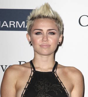 Miley Cyrus gets new heart tattoo amid broken romance rumors