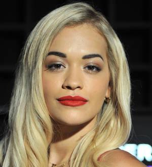 Rita Ora battles jet lag at London show