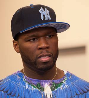 Video star drops 50 Cent legal battle