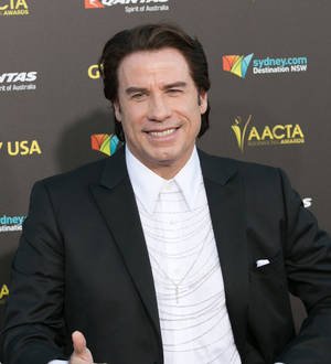 John Travolta blames broken elevator and Goldie Hawn for Idina Menzel mix-up