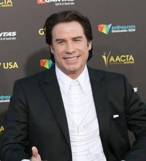 John Travolta blames broken elevator and Goldie Hawn for Idina Menzel mix-up