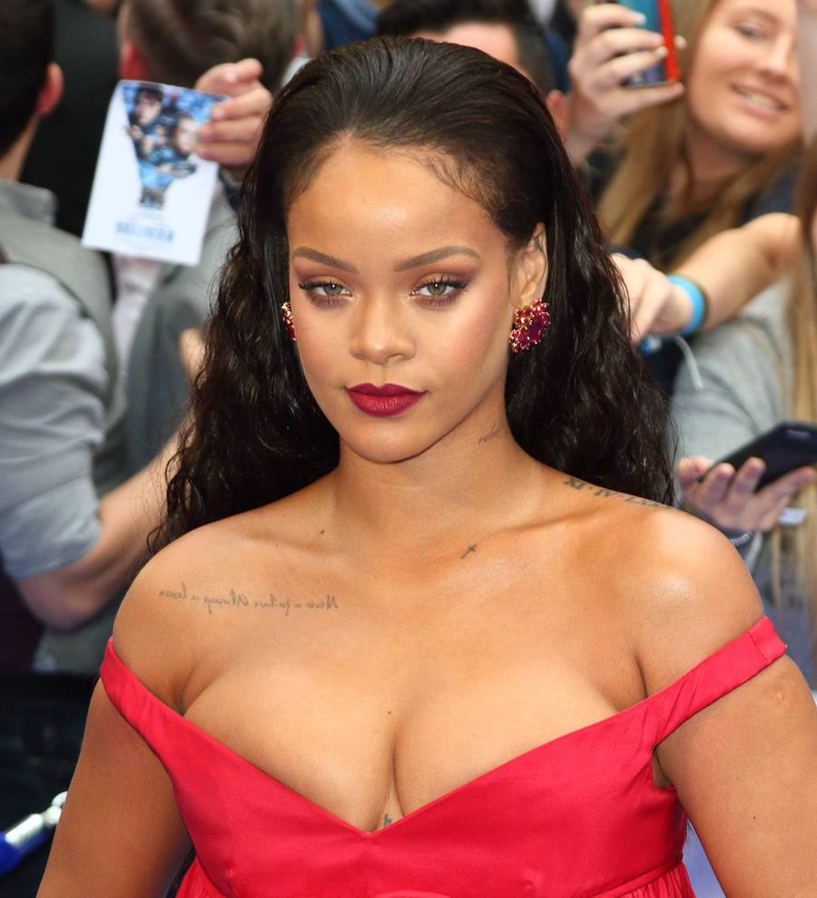 Rihanna revs up for fashion show with bike entrance