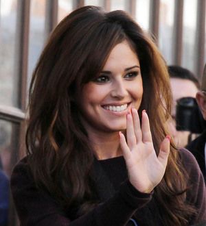 Cheryl Cole battling exhaustion after car crash