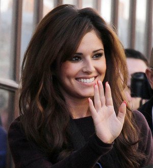 Cheryl Cole battling exhaustion after car crash