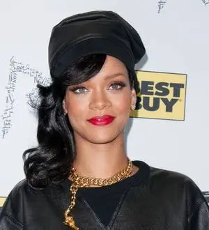 Rihanna offers up Brown reunion tip in tweet from Ivory Coast