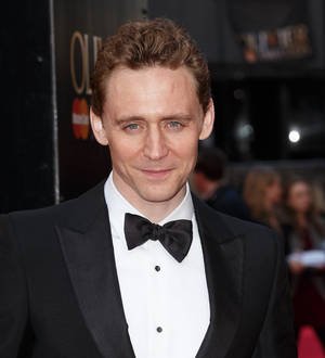 Tom Hiddleston makes surprise appearance at music festival