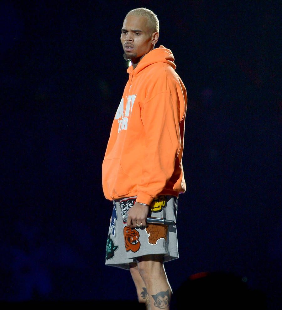 Chris Brown restraining order hearing postponed as ex fails to show up in court