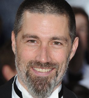 Matthew Fox with closely shaved head and a dark beard in a promotional image for the movie, Bone Tomahawk