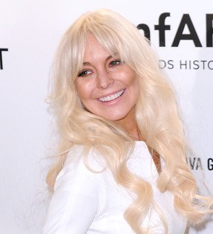 Lohan jokes about troubled reputation on SNL