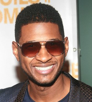 Usher beats Jessica Szohr in puppy auction