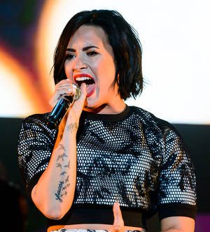 Demi Lovato denies mocking Ariana Grande with patriotic Made in the USA performance