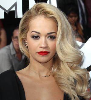 Rita Ora settles sneaker battle