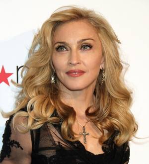 Madonna facing legal action over perfume logo