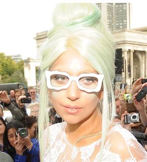 Gaga honors Clemons at charity show