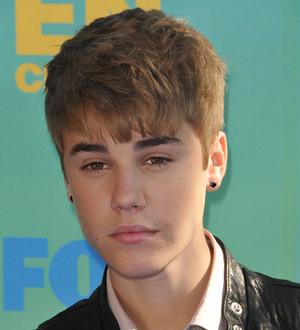Justin Bieber 'ignoring rumours, focusing on the music'