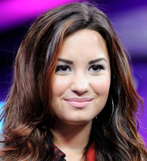 Demi Lovato's dad stunned by new tattoo