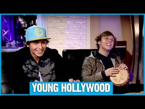 Keaton Stromberg of Emblem3 poses outdoors with a tree behind him