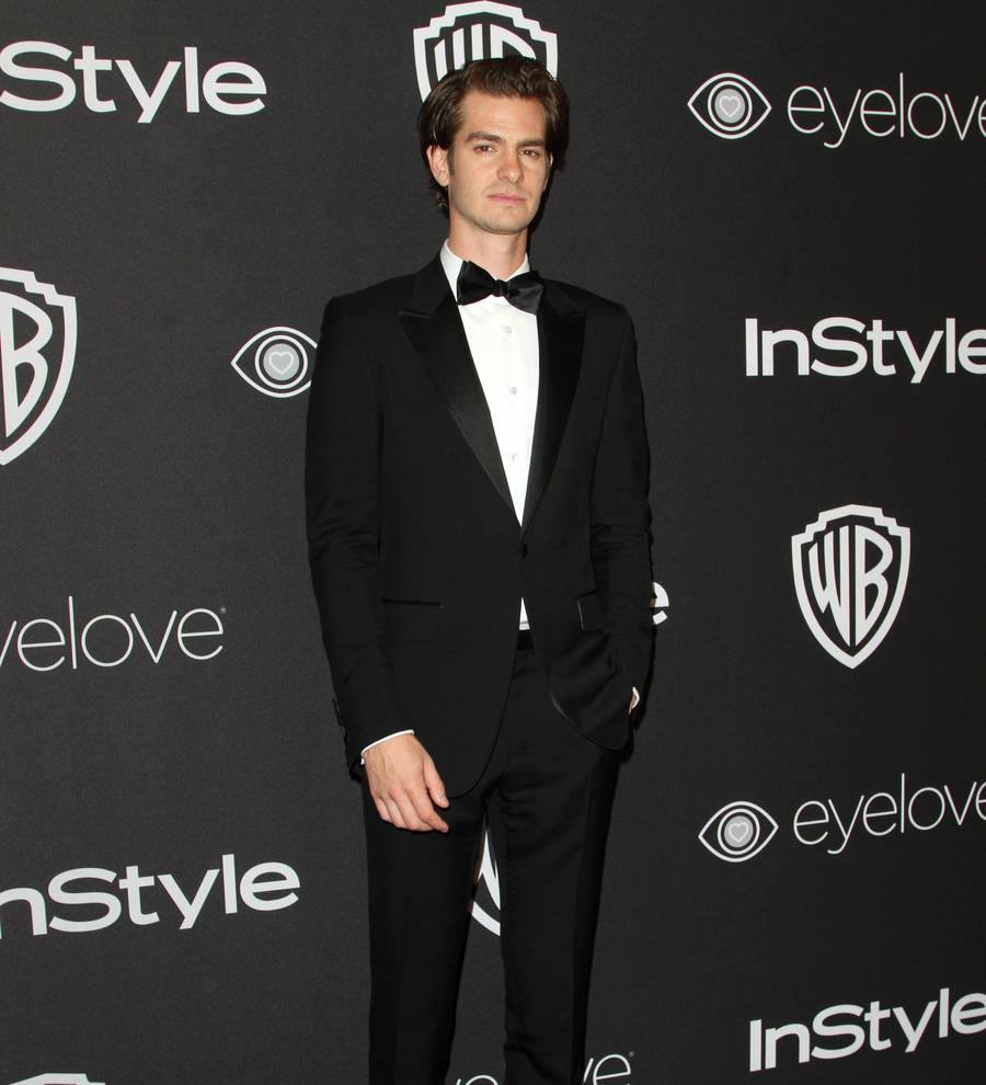 Andrew Garfield smooches presenter as he reveals motivation for Ryan Reynolds kiss