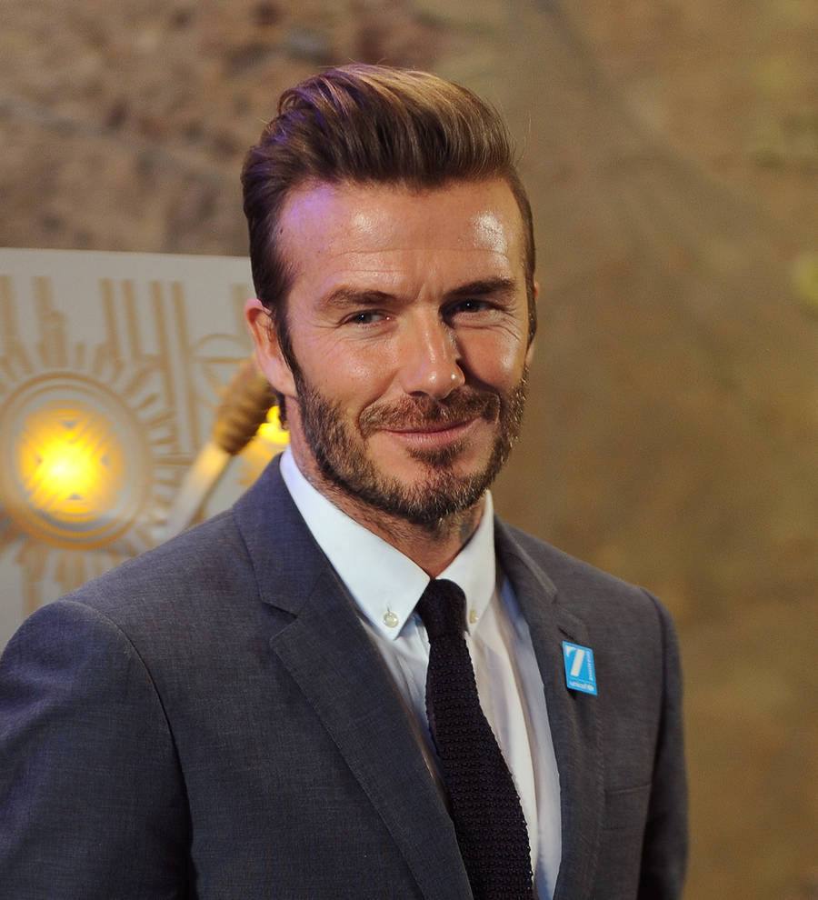 David Beckham helps elderly woman after collapse