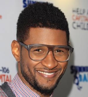Usher told to reopen ex-wife's designer store account