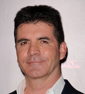 Cowell 'increases home security' after threats
