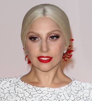 Lady Gaga drinks wine to numb the pain of bleaching her hair