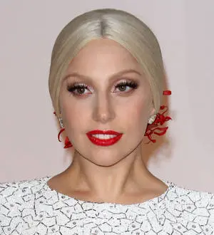 Lady Gaga drinks wine to numb the pain of bleaching her hair