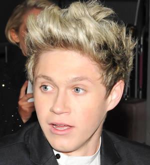 One Direction don prosthetics for new music video