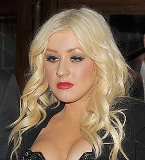 Christina Aguilera considers legal action over child abuse reference