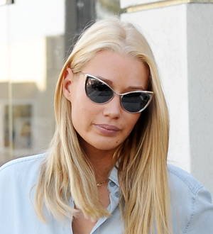 Iggy Azalea returns to Twitter to respond to Erykah Badu's rap diss