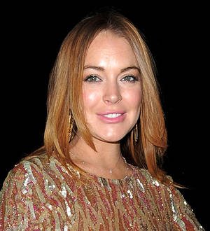 Lindsay Lohan dances in her underwear for advent calendar stunt