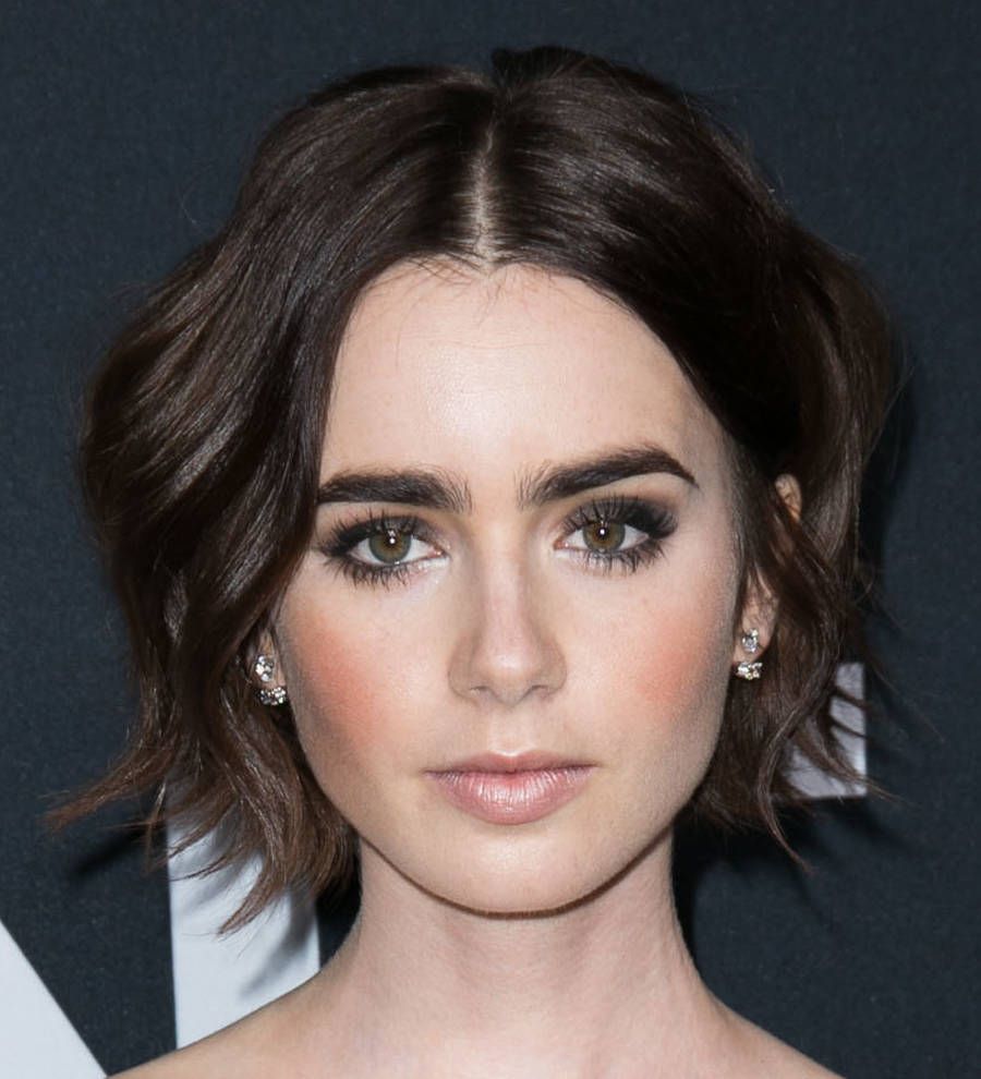 Lily Collins opens up about tough relationships for memoir