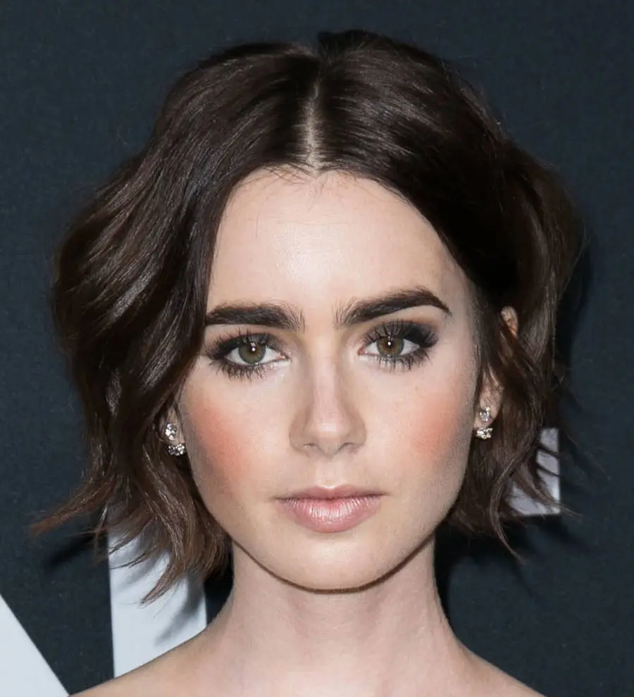 Lily Collins opens up about tough relationships for memoir