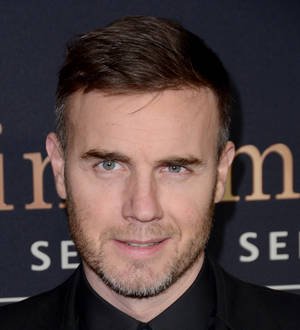 Gary Barlow makes fan's wedding dreams come true with surprise visit