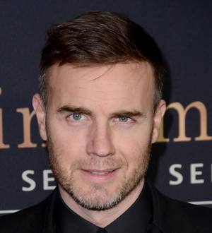 Gary Barlow makes fan's wedding dreams come true with surprise visit
