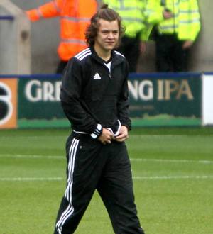 Harry Styles pulls down Piers Morgan's pants at soccer game