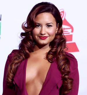 Demi Lovato returns to treatment centre to help others