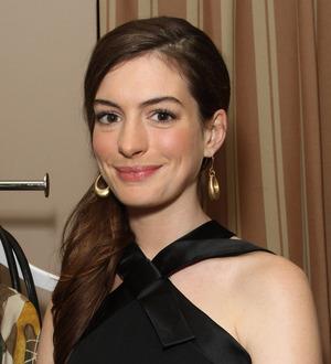 Hathaway 'delays wedding for work'