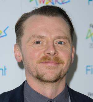 Simon Pegg nursing ankle injury