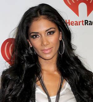 Nicole Scherzinger visits impoverished Filipino families