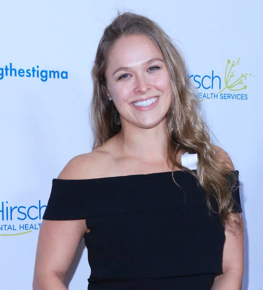 Ronda Rousey challenges Ric Flair's daughter to wrestling showdown