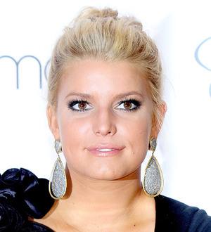 Jessica Simpson slams breast reduction reports