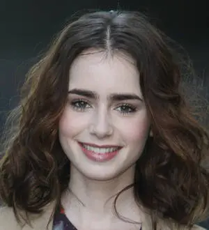 Lily Collins helps fainted fan at autograph signing