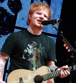 Ed Sheeran receives The Hobbit sword from Peter Jackson