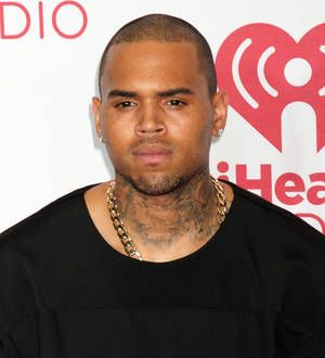 Chris Brown apologises to Karrueche Tran