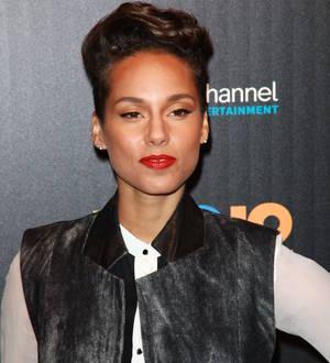 Alicia Keys visits Typhoon Haiyan evacuees